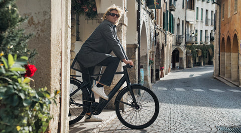 Euphoric Cycling Experience: Rider Embracing the Thrill of the Smart eBike EVIE S1 Adventure